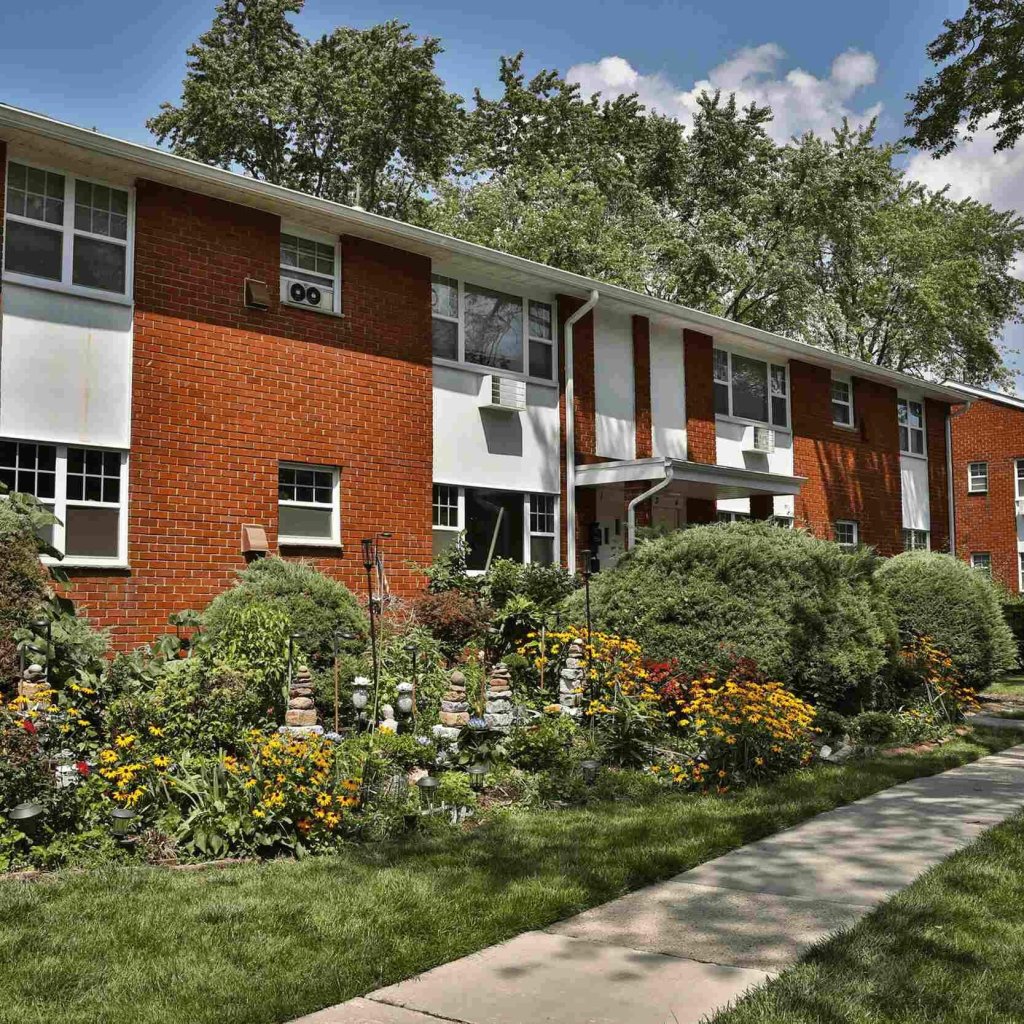 patridgerunapartments community building sidewalk garden